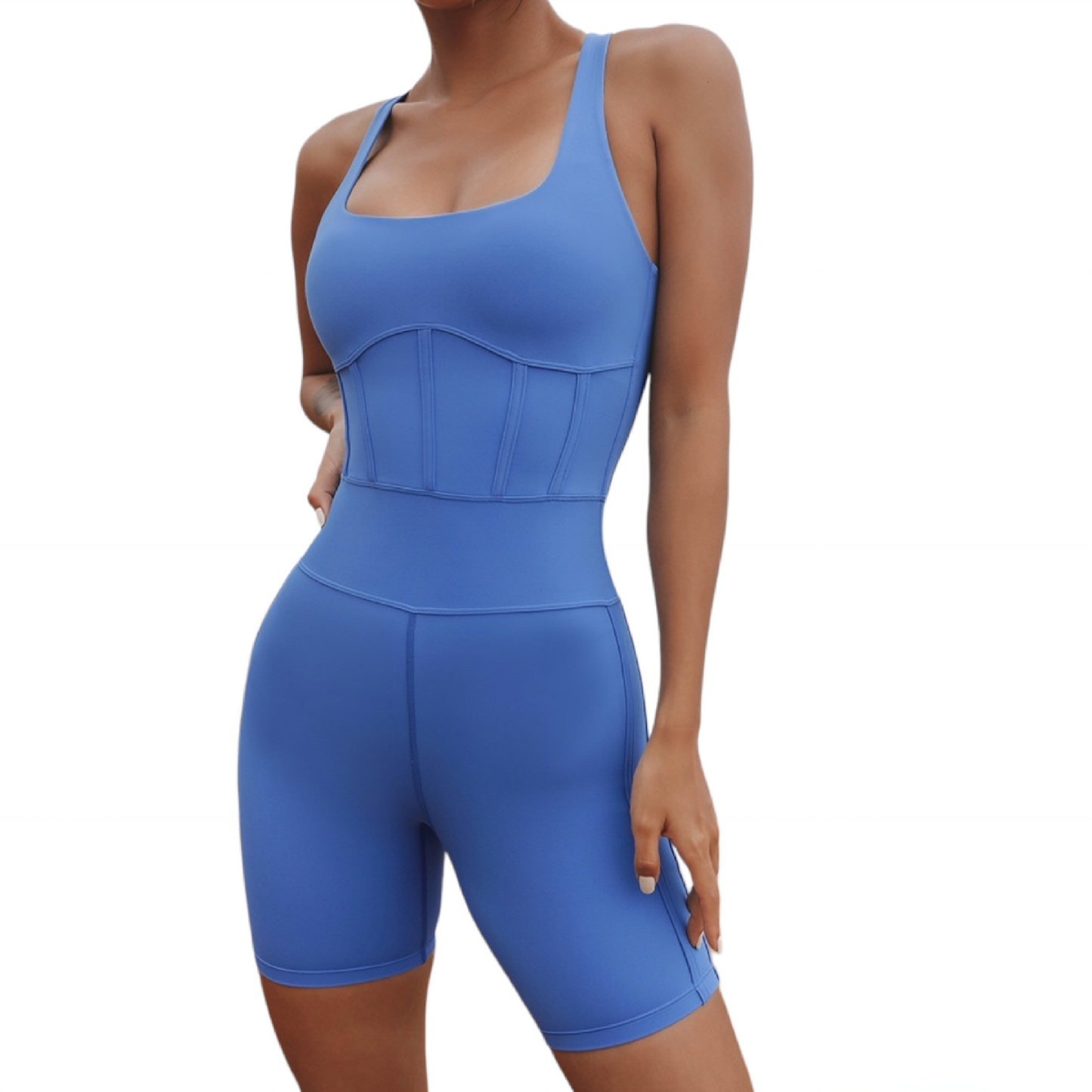 Fitness model wearing a sexy, squat proof,  baby blue short jumpsuit  from Vibras Activewear.
