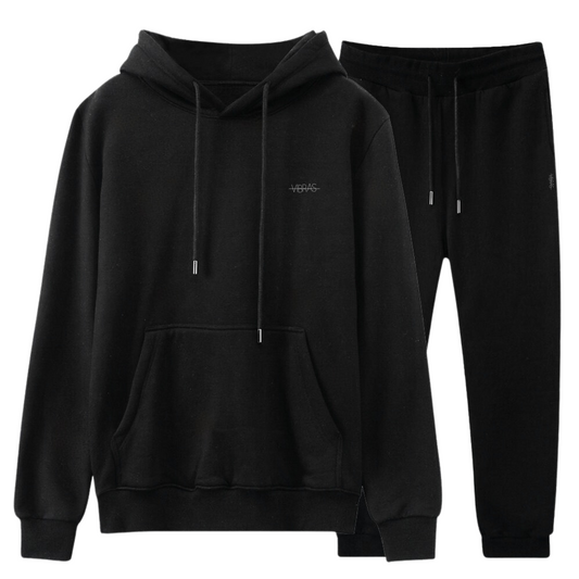 Photo of a cozy and unisex fleece tracksuit set in the colour charcoal.