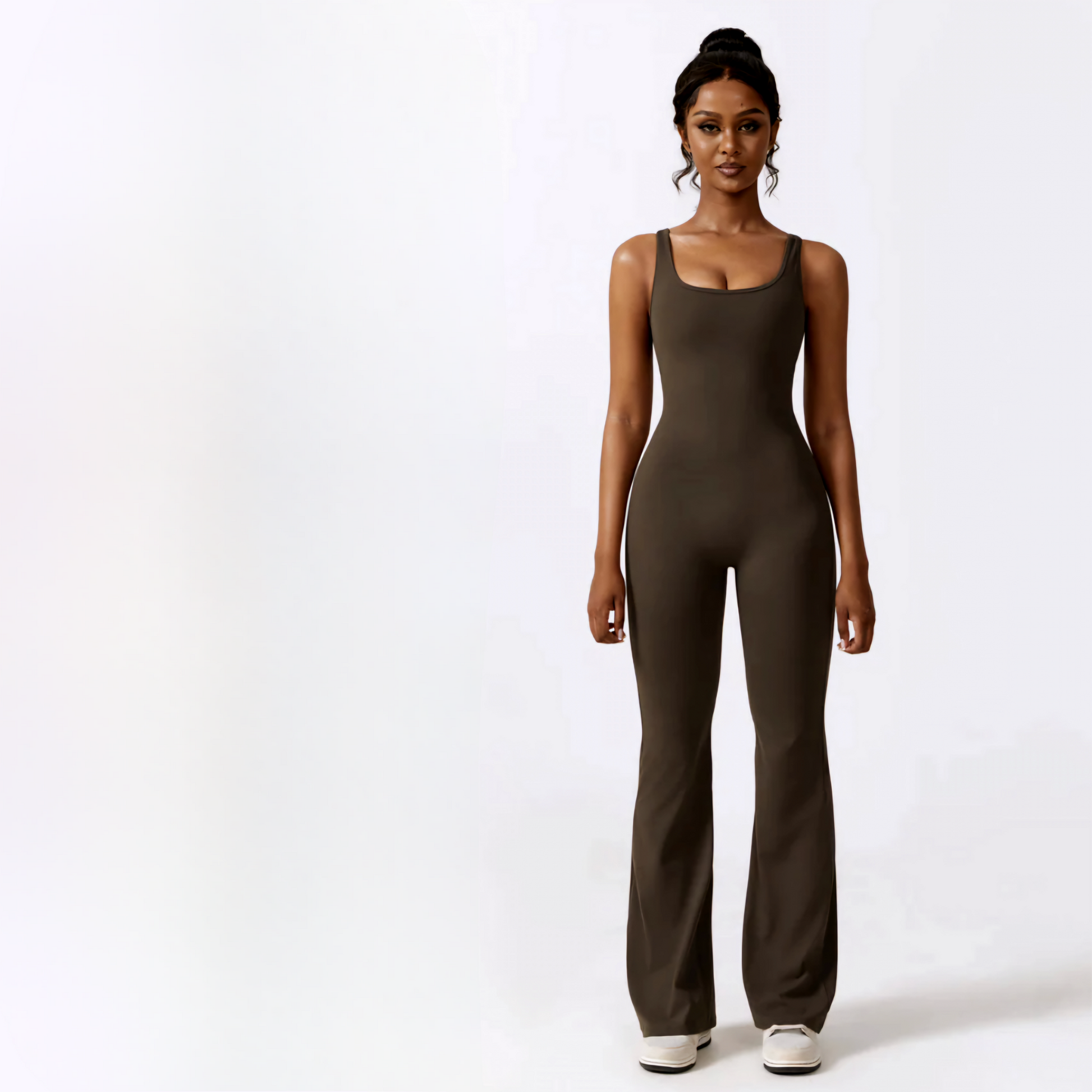 Fitness model showcasing the beautiful and comfortable Samara jumpsuit on mocha, from Vibras Activewear. 
