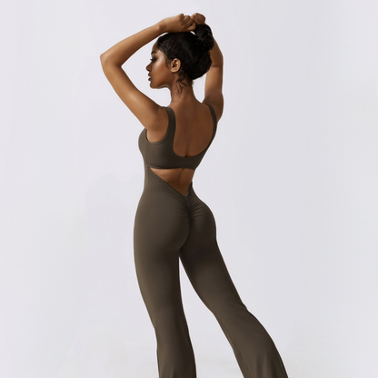 Back photograph of fitness model showcasing the ruching and butt enhancing details of the mocha Samara Jumpsuit from Vibras Activewear.