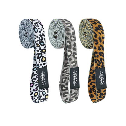 A set of three long body resistance bands with cheetah prints from vibras on a white background