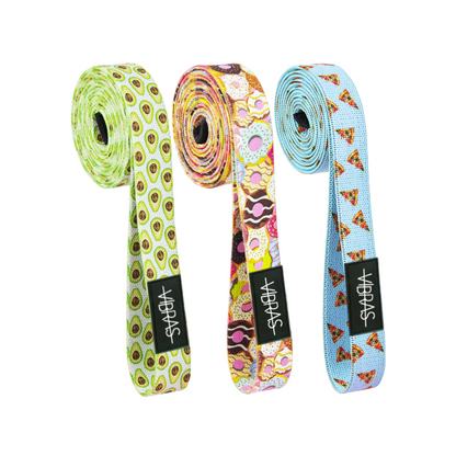 A set of three long body and loop resistance bands with fun designs from vibras on a white background