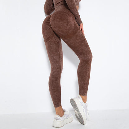 fitness female model wearing brown acid wash workout leggings that outline the booty well from Vibras Activewear