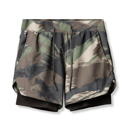 a pair of camouflage elijah gym shorts with liner underneath on a white background