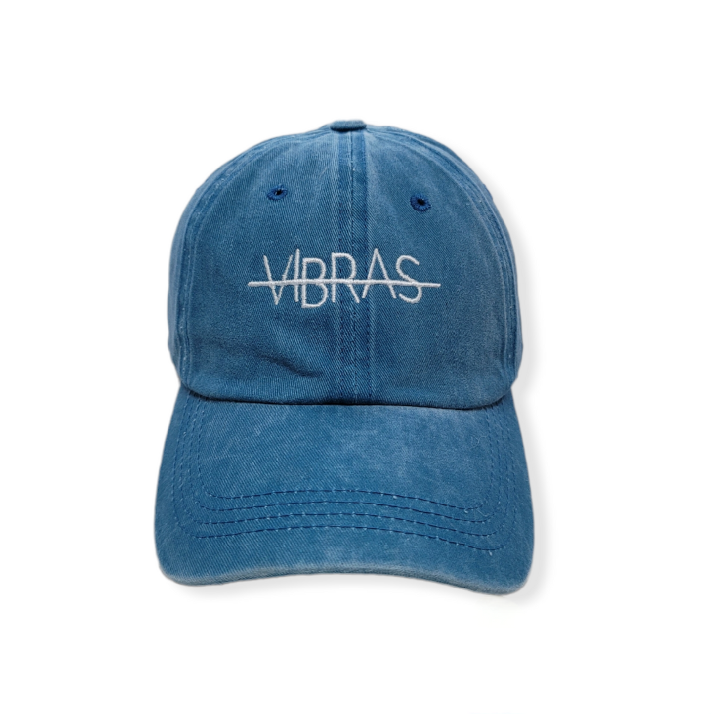 PHOTO OF DEEP BLUE GREY BASEBALL CAP FROM VIBRAS ACTIVEWEAR ON A WHITE BACKGROUND.
