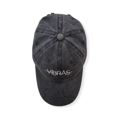 PHOTO OF MIDNIGHT BLACK BASEBALL CAP FROM VIBRAS ACTIVEWEAR ON A WHITE BACKGROUND.