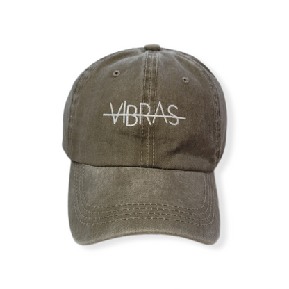 PHOTO OF A TAN BASEBALL CAP FROM VIBRAS ACTIVEWEAR ON A WHITE BACKGROUND.