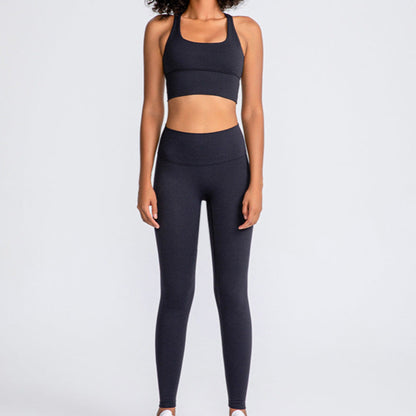 Fitness model wearing a black  activewear matching set  from Vibras Activewear