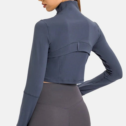 Model wearing an Indigo Blue Crop Jacket from Vibras Activewear.