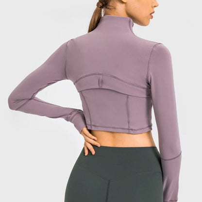 back view of model wearing mauve Crop Jacket from Vibras Activewear.